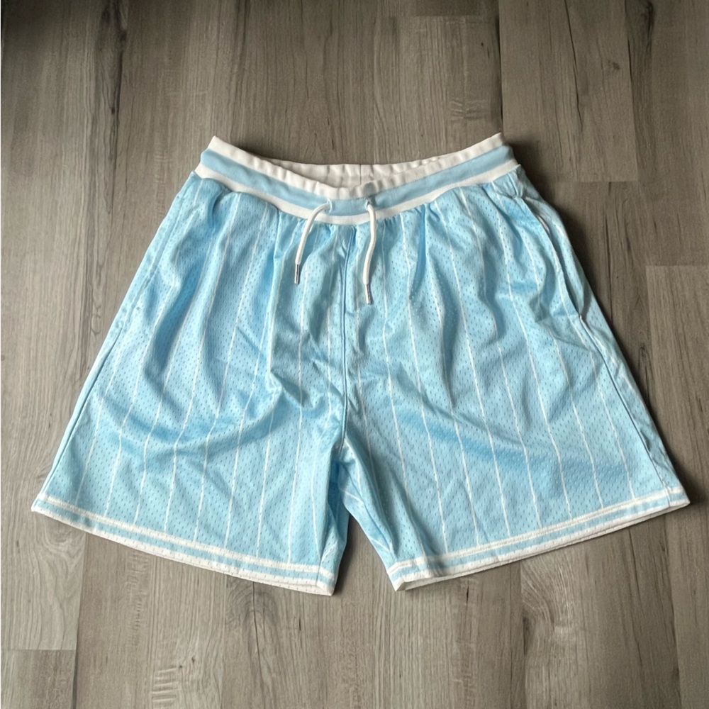 Light Blue Mesh Basketball Shorts with White Trim